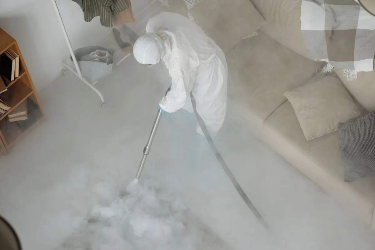 Biohazard cleanup technician in protective equipment, North Ogden, UT